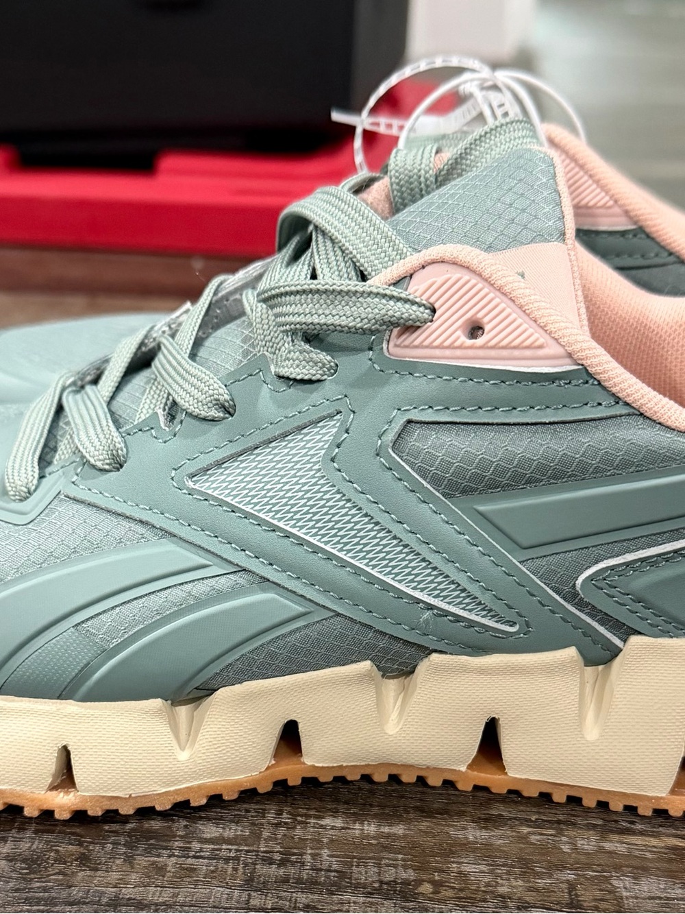 Reebok Women’s Sneaker in Sage Green with Blush Accents